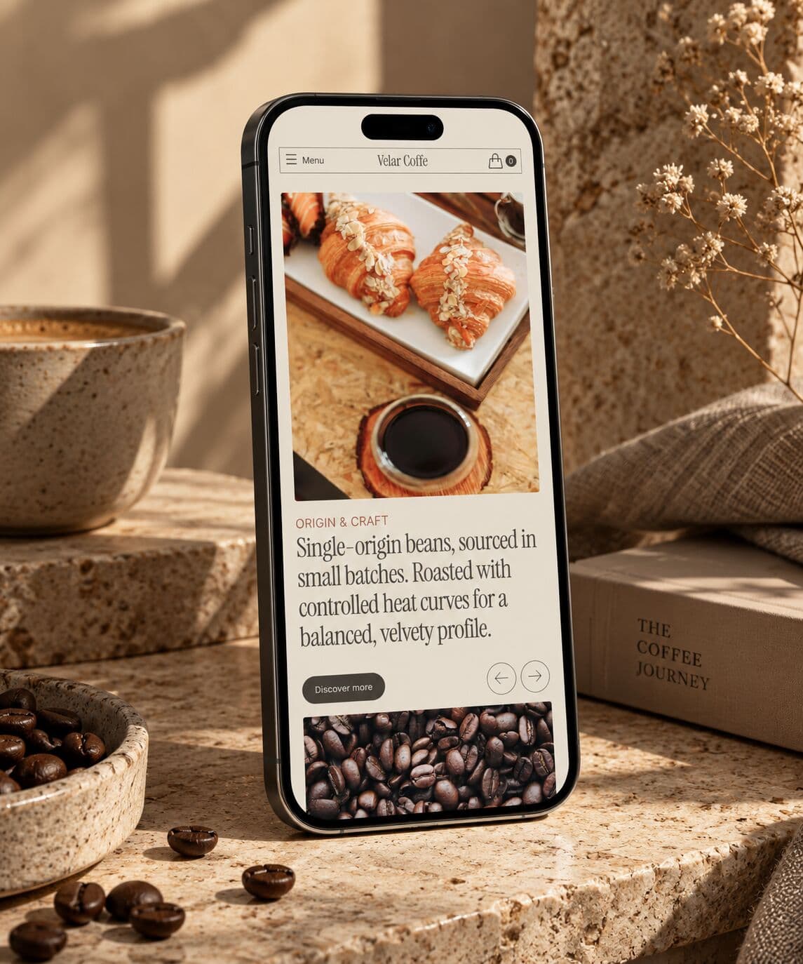 The Velar homepage on a phone: pastry photography over the origin and craft story